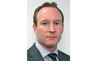 Harman promotes David McKinney